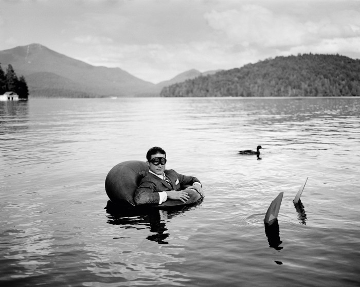 James in Inner Tube with Duck, Lake Placid, New York, by Rodney Smith