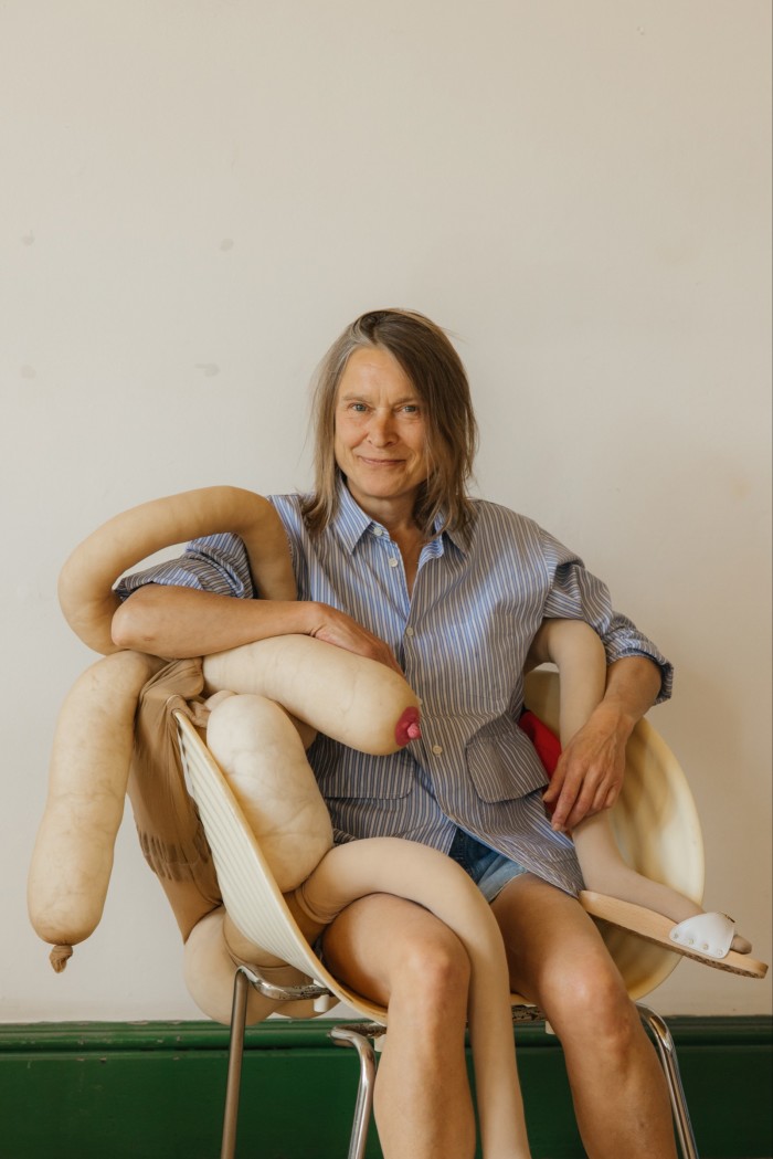 Sarah Lucas with one of her Bunnies sculptures