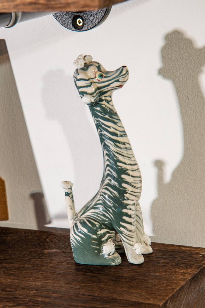 The dog-giraffe figure Lambert picked up at a thrift store in LA