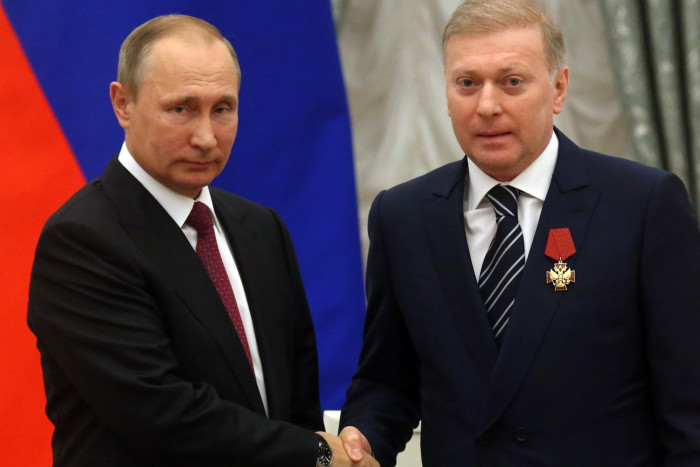 Russian President Vladimir Putin, left, and businessman Musa Bazhaev in 2016
