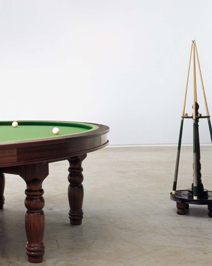 View of the edge of an oval billiard table