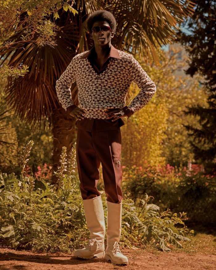 Prada wool jumper, £750. Jil Sander by Lucie and Luke Meier cotton shirt, £640, wool trousers, £690, and leather boots, £950. Port Tanger acetate Crepuscolo sunglasses, £230