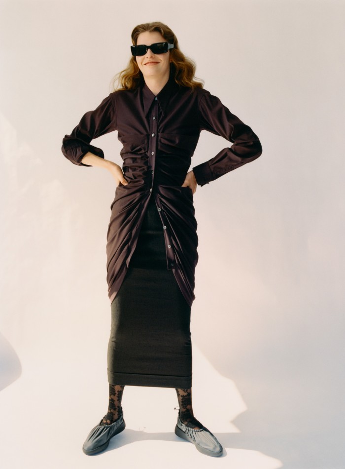Romeo Gigli cotton shirtdress, $795, and wool skirt, $495, both from Resurrection Los Angeles. Calzedonia lace tights, £13. Issey Miyake rubber Cover shoes, £235. Cutler & Gross acetate 1368 Rectangle sunglasses, £320