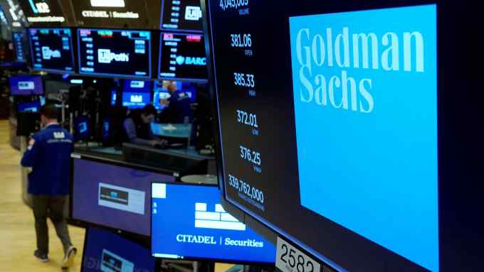 Goldman Sachs logo at a trading post on the floor of the New York Stock Exchange
