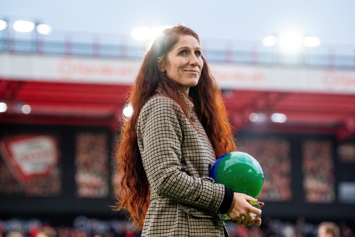 Lise Klaveness holding a football