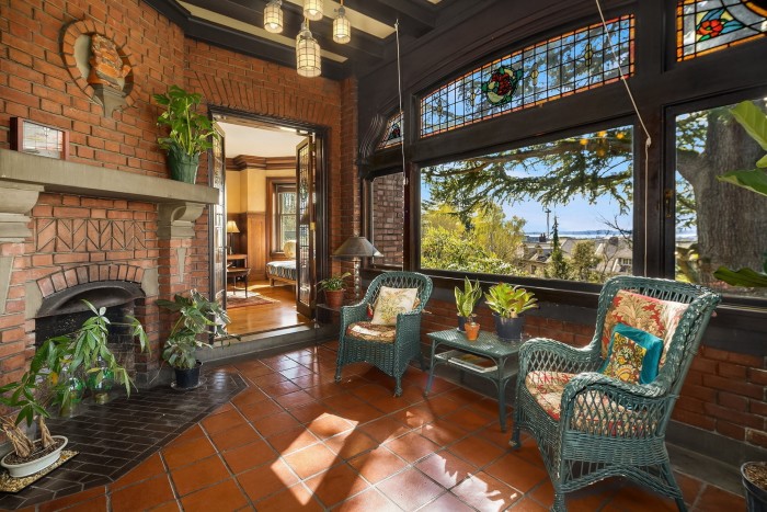 An arts and crafts style interior and stained glass window in a house in Capitol Hill, Seattle, $4.85mn