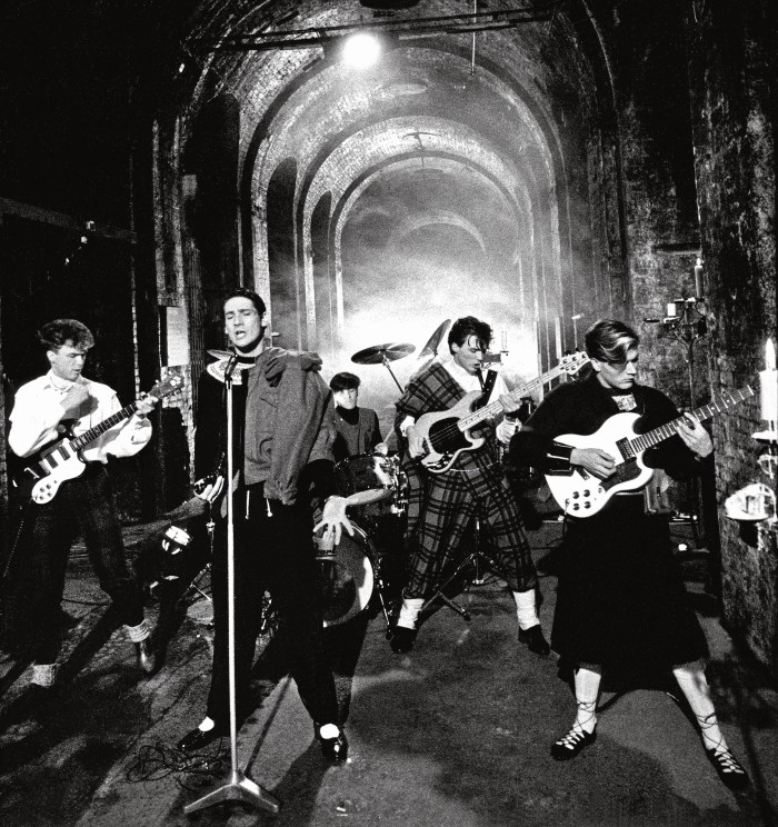 Kemp (far left) performing with Spandau Ballet at the London Dungeon, 1980