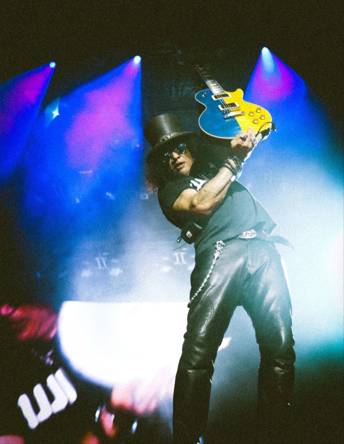 Slash plays a Gibson Les Paul in the colours of the Ukrainian flag