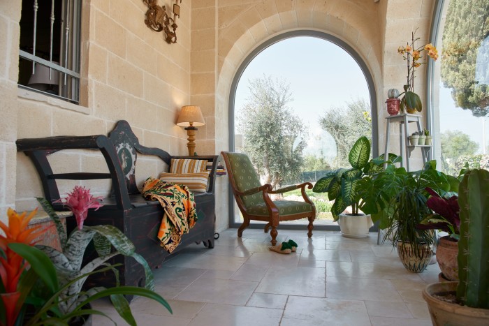 The eclectic mix of furniture makes the masseria feel like a home