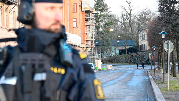Police officers are seen outside the Israeli embassy in Stockholm in January, 2024