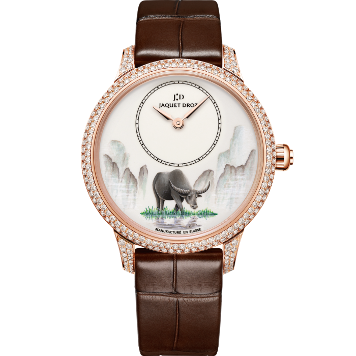 Jaquet Droz Ateliers d’Art collection Petite Heure Minute Buffalo: ivory Grand Feu enamel dial with miniature painting in an 18ct red-gold case set with 232 diamonds, £37,450. Limited edition of eight