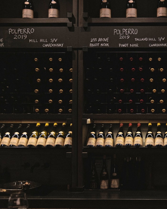 Shelves of bottles of wine at Polperro