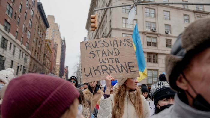 People protest against Putin’s invasion of Ukraine near the Consulate-General of the Russian Federation in New York City.