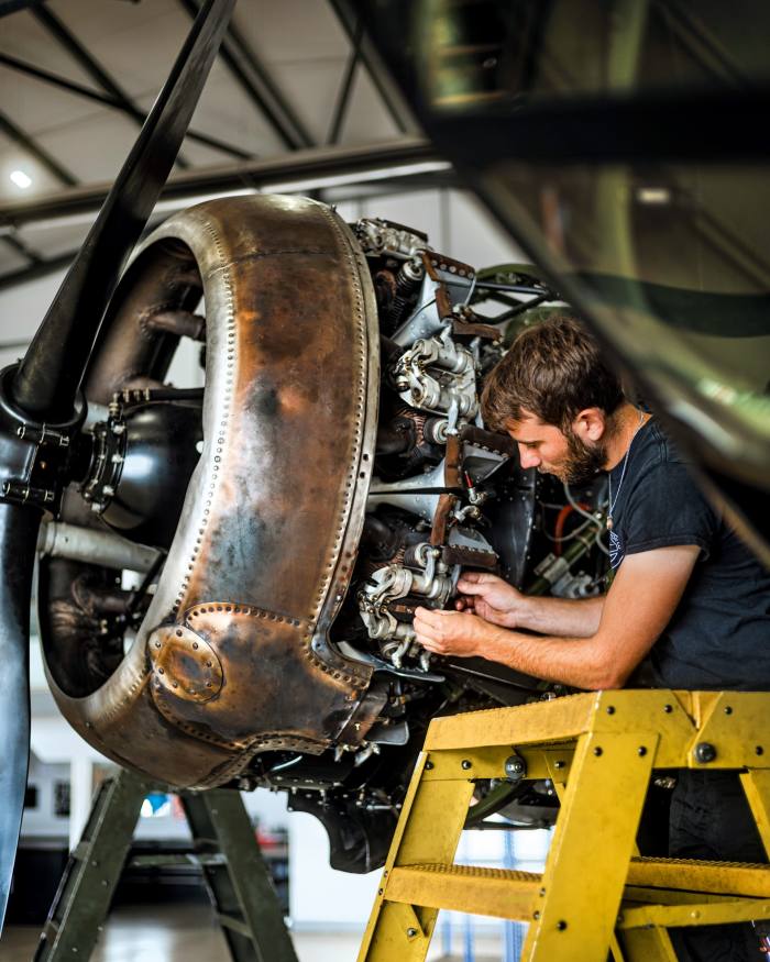 Maintenance work is carried out on the Bristol Blenheim Mk I’s Mercury engine