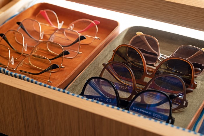 Her reading glasses and sunglasses by Caddis