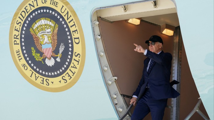 US President Joe Biden disembarks from Air Force One in Chicago on Monday