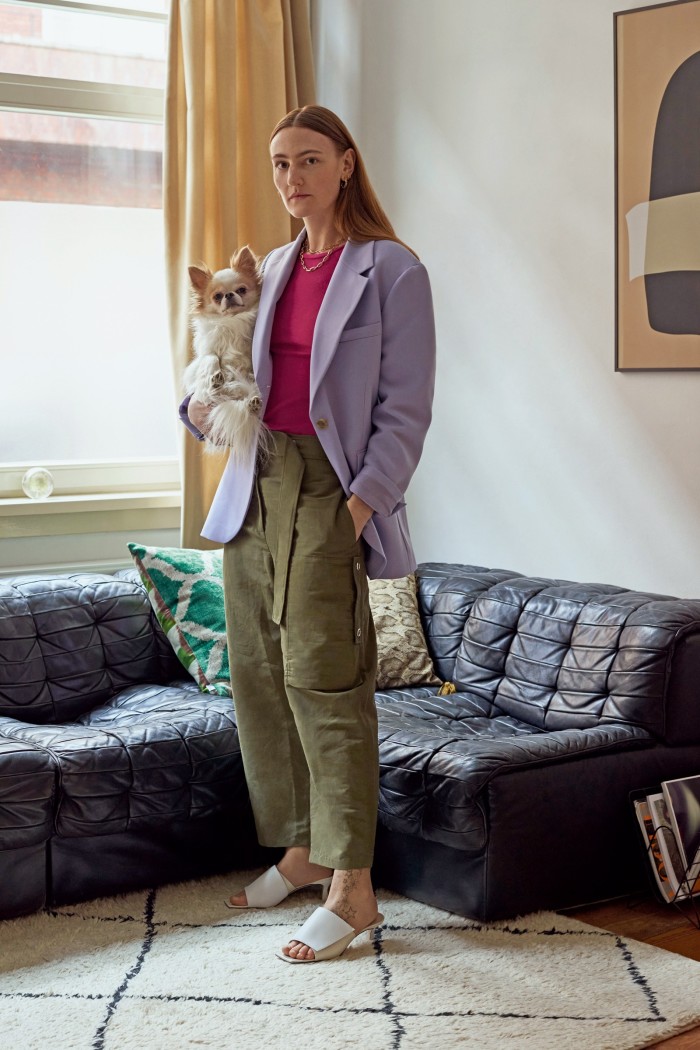 Fashion designer Elza Wandler at home with her chihuahua Billy