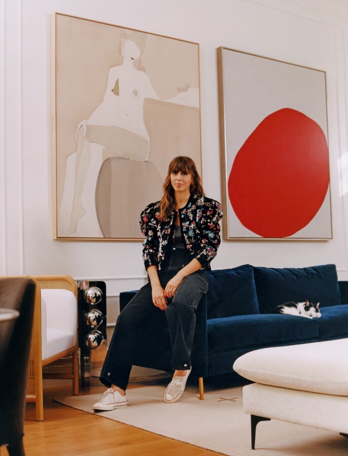 Her living room with paintings by Kristen Giorgi (left) and Fong Min-Liao