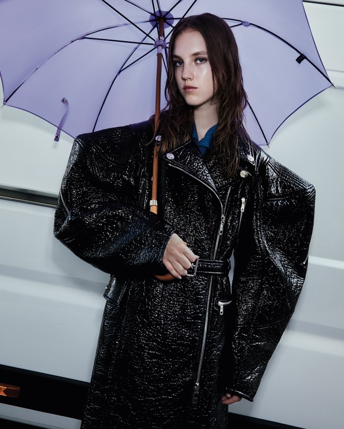 Dolce & Gabbana leather padded-shoulder coat, £4,600. Solid Homme wool collar, £126. Galerie Fayet wood-handled umbrella, £150