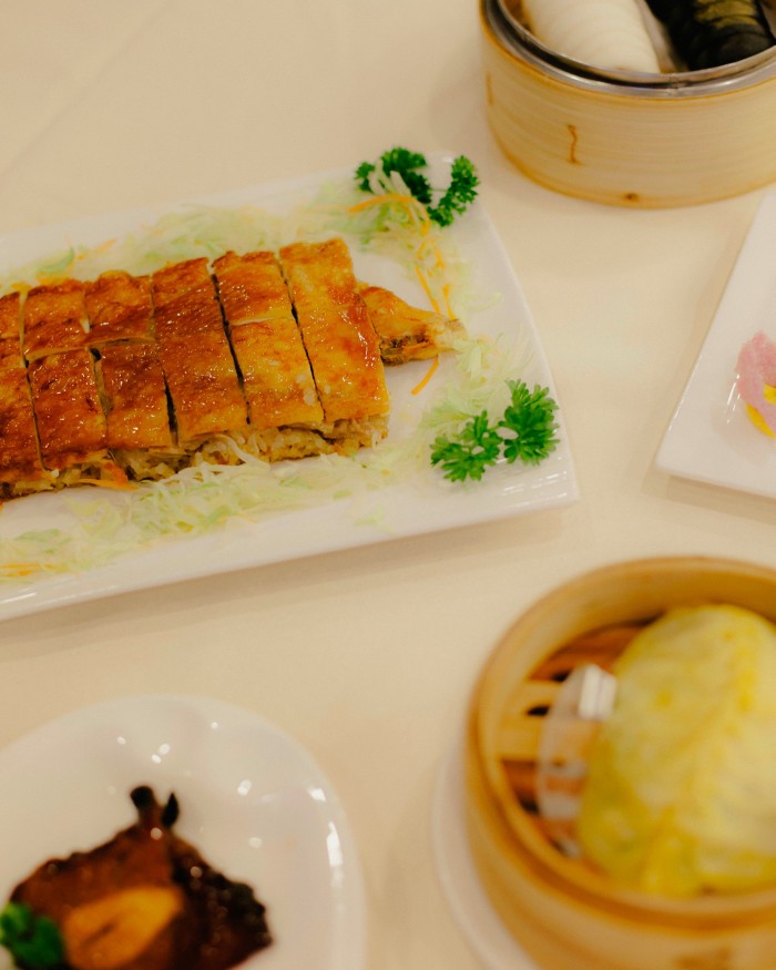 One of Pang’s signature dishes: roasted Gold Coin chicken (alongside a minced pork and seafood dumpling) 