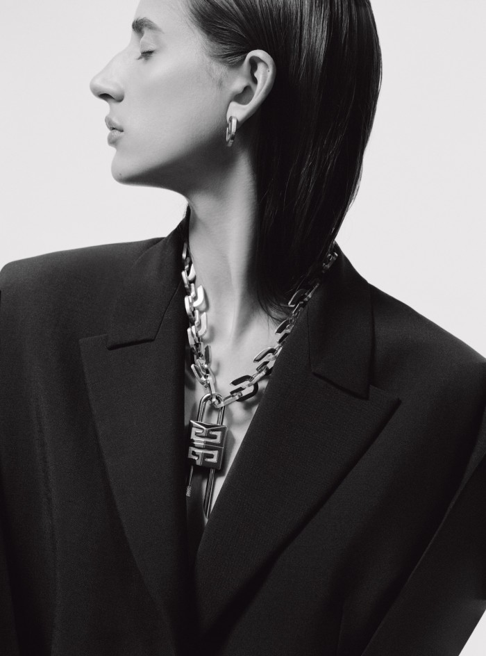 Givenchy silver necklace, £1,590, silver and opal G earrings, £450, and cotton coat, £2,390