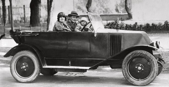 F Scott Fitzgerald at the wheel in Italy with his wife Zelda and daughter Scottie