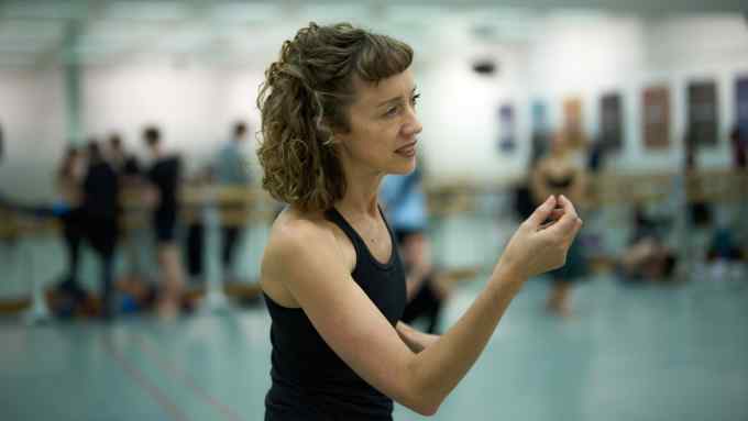 A woman in a dance studio