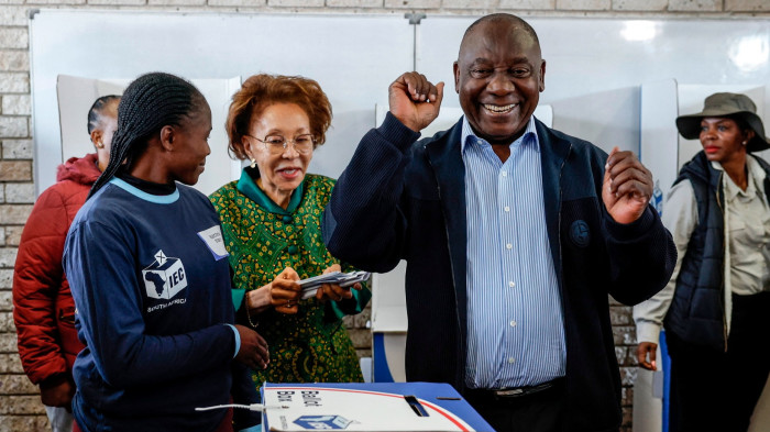 Cyril Ramaphosa reacts after casting his ballot at Hitekani Primary School polling station in Soweto 