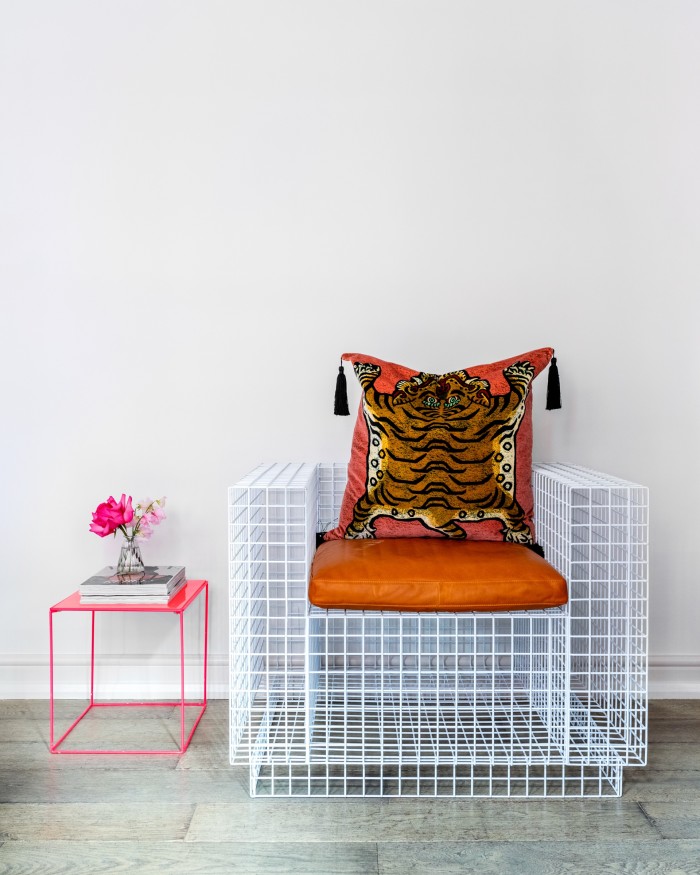 Her Virgil Abloh limited-edition chair with leather cushion. The House of Hackney tiger cushion was a gift from a stylist 
