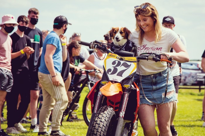 Leah Tokelove and dog Dingo with her pro-class KTM 450