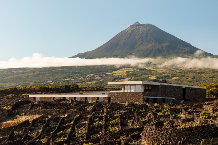 Azores Wine Company winery and hotel, with the Pico volcano in the background