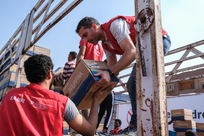 Save the Children staff in Egypt prepare supplies to be delivered to Gaza