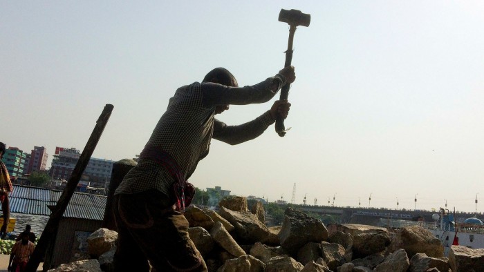 Hard labour: stone breaking in Dhaka
