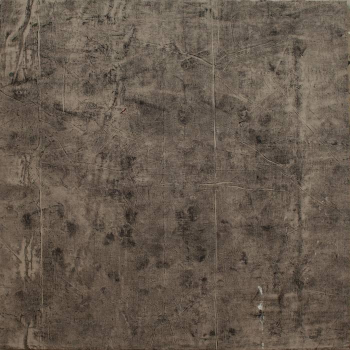 A brown square painting covered in scratches and dark marks that resemble dirt