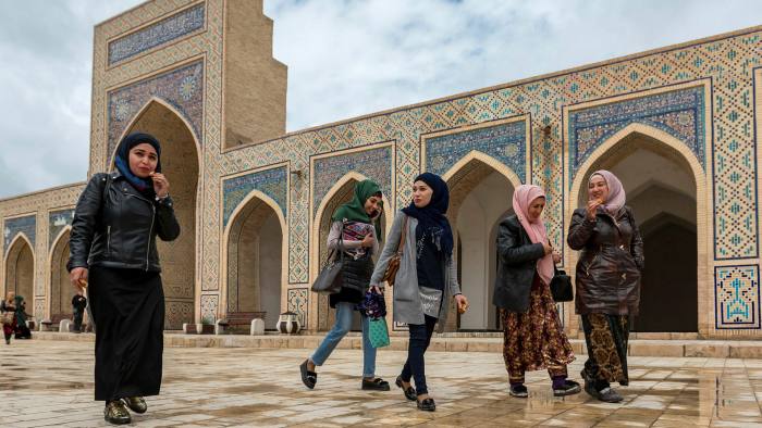 Young Uzbek women at the Kalan mosque in Bukhara