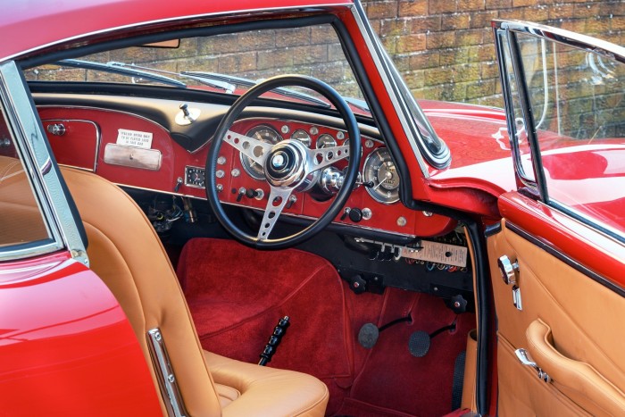 The interior of the right hand drive car has been retrimmed to concours standard