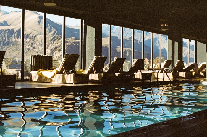 The swimming pool at Rooms Hotel Kazbegi, with views of the dormant Kazbek volcano that rises to over 5,000m