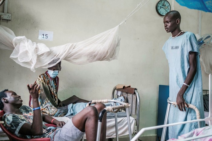 Patients who suffered gunshot wounds on a ward in a military hospital in Juba. Violence erupted in South Sudan two years after its 2011 independence, leaving 400,000 people dead and derailing the nascent state-building process