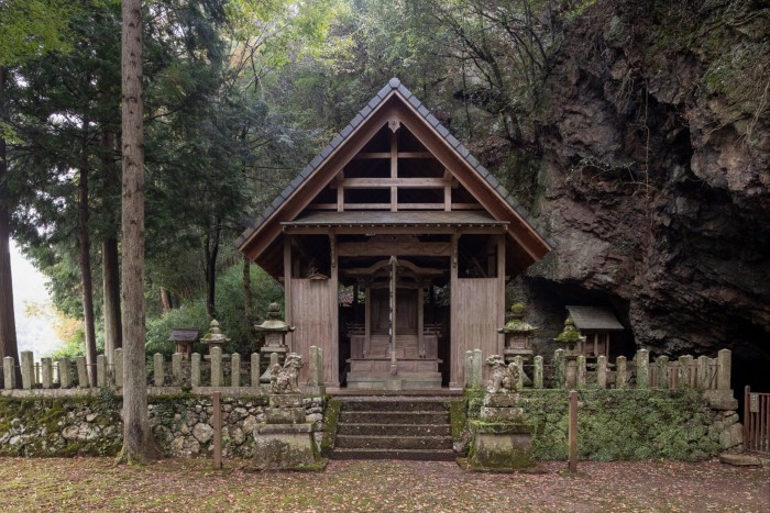 A small wooden building set among trees