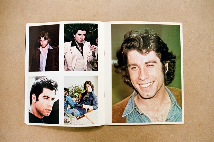 Her John Travolta postcard book