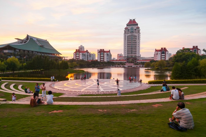 Gardens and lake of Xiamen University landscape at sunset