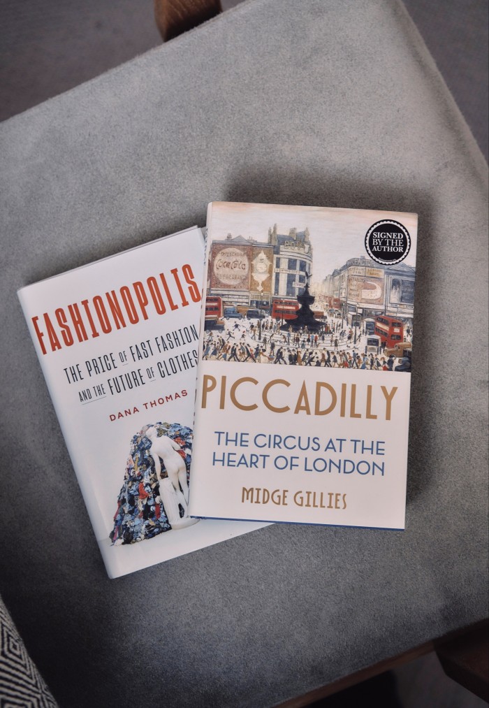 Two books Modine has received while working in London: “one is about the environmental cost of fast fashion and the other a history of the neighbourhood I’m working in”