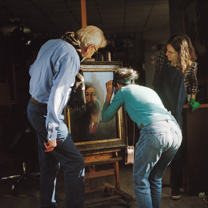 Gillespie at work with two of his senior accredited conservator-restorers (from left), Majo Prieto Pedregal and Maria Giulia Caccia Dominioni