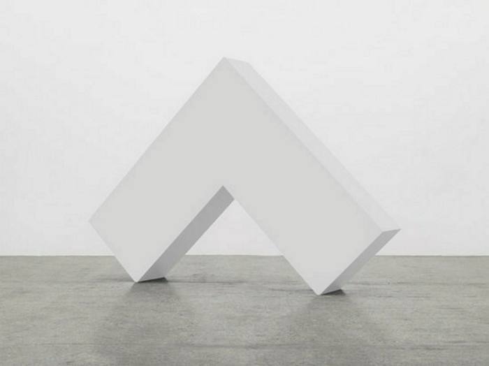 A ^ sign made into a large white sculpture