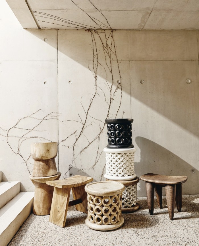 Khayni Bamileke and Donut stools (front and stacked), from £620, and Senufo stool (far right), £640