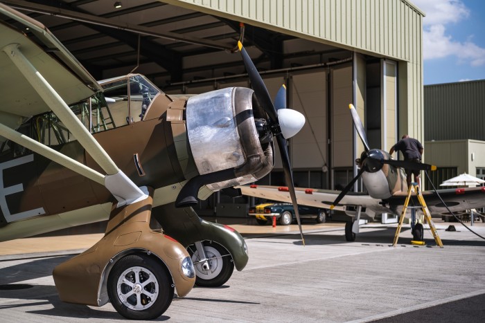 A Westland Lysander and (right) a Spitfire Mk I