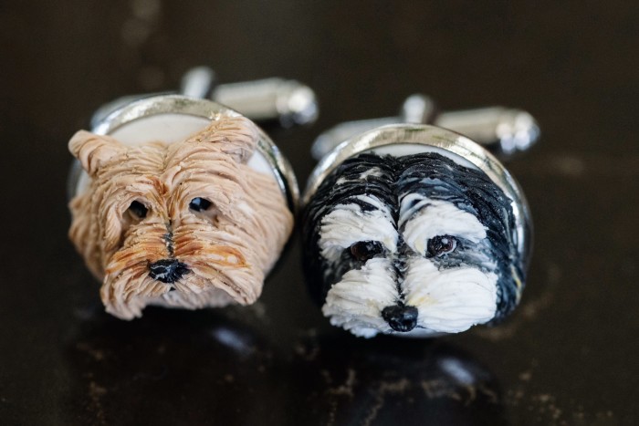 His cufflinks of his two dogs, Winston and Clementine