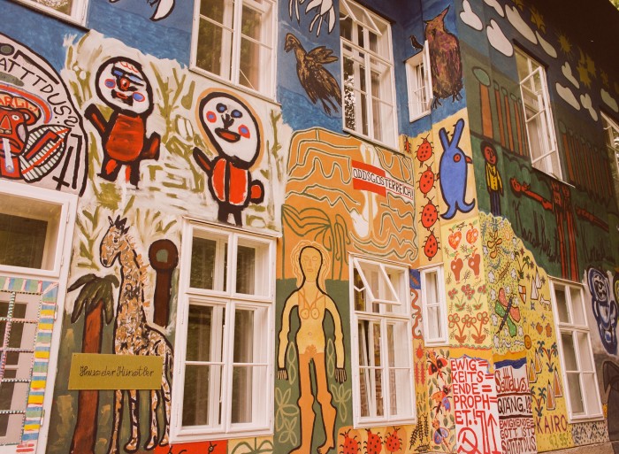 The wall of the House of Artists, with murals painted by several Gugging artists