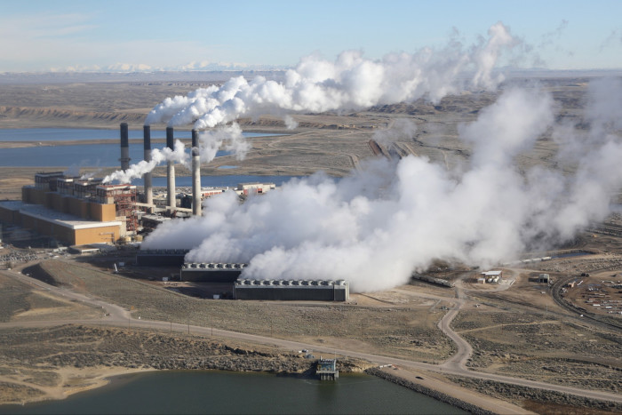 Steam rises from the coal-fired Jim Bridger power plant outside Rock Springs, Wyoming