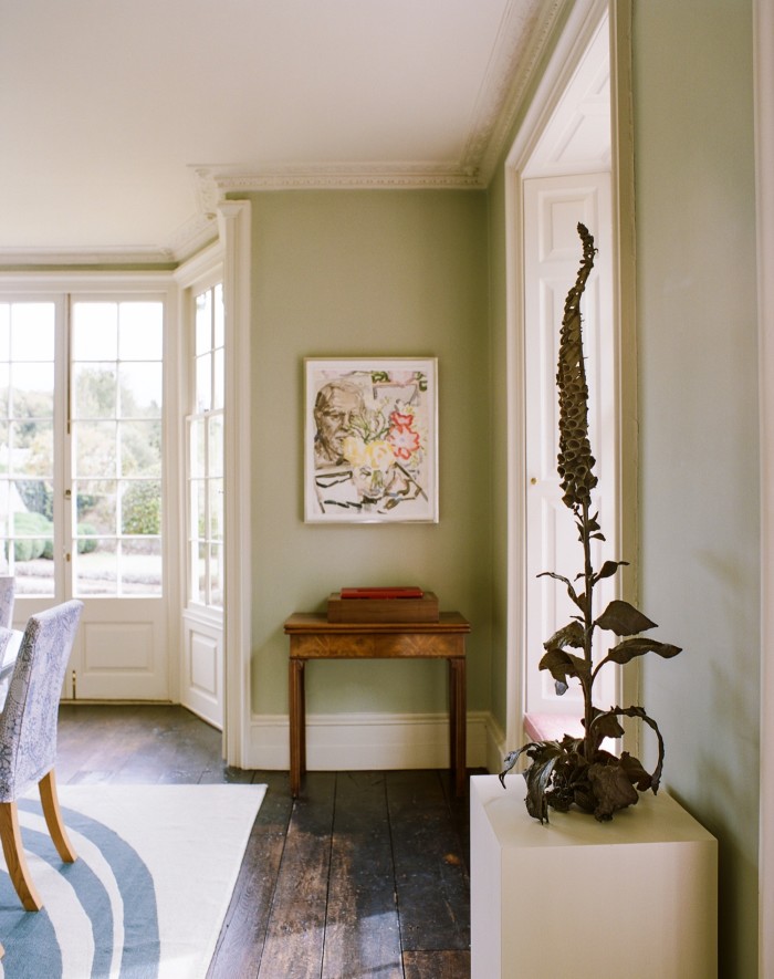 A painting by Elizabeth Peyton, centre, and Foxglove sculpture by Dorothy Cross in Ephson’s home